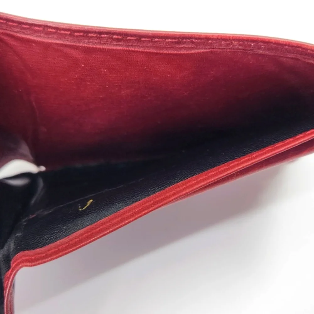Dior Burgundy Wallet with Gold “CD” Accent. Good condition.